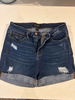 Judy Blue Medium Dark Wash Distressed Rolled Hem Jean Shorts - Blue